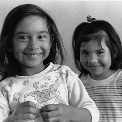 2 smiling young girls