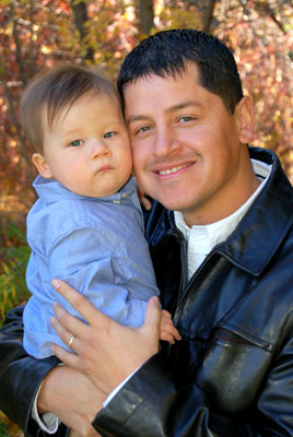 smiling father and son